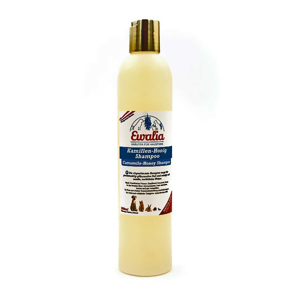 Beige Shampoo-Flasche mit goldfarbenem Deckel. Etikett mit Produktnamen und Logo. Für Haustiere.