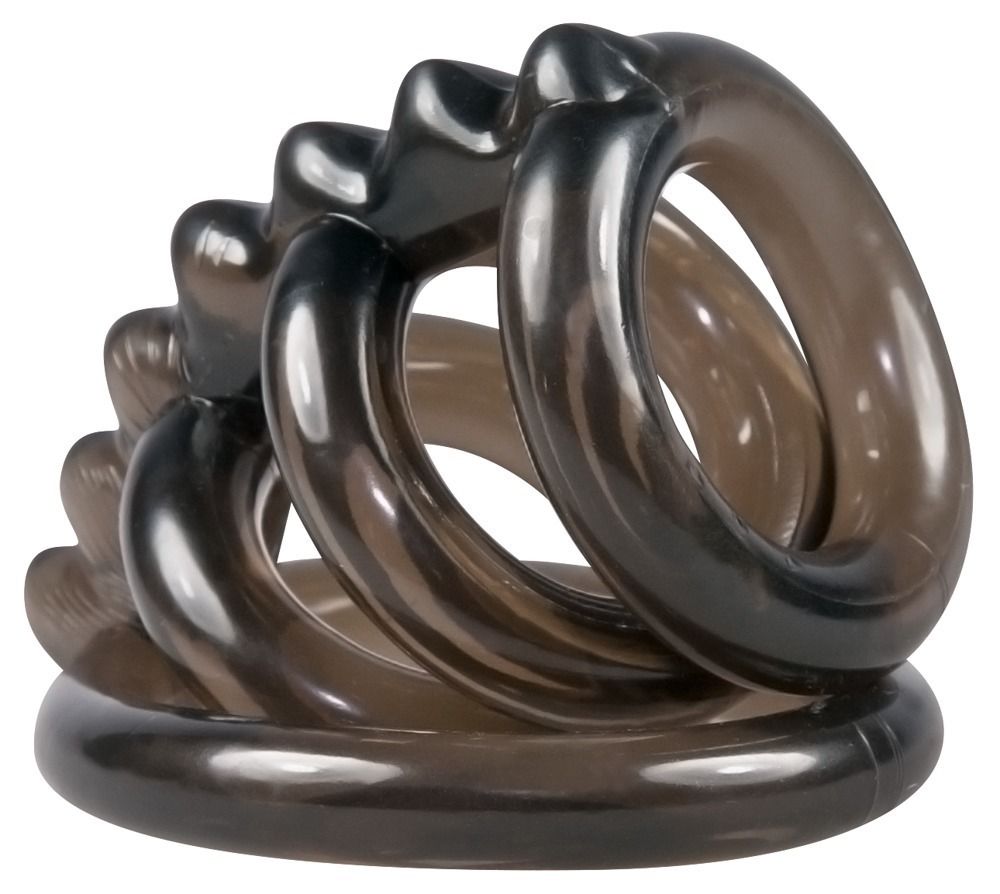 Schwarzer Penis-Hodenring mit vier Ringen und wellenförmigem Steg. Mehrere Ringe überlappen sich.