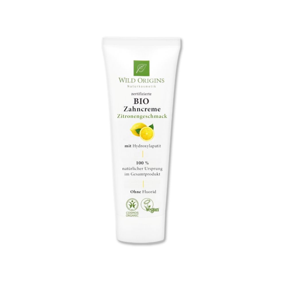 Weiße Tube mit "Wild Origins" und "Bio Zahncreme Zitrone". Zertifizierungen und Inhaltsangaben.