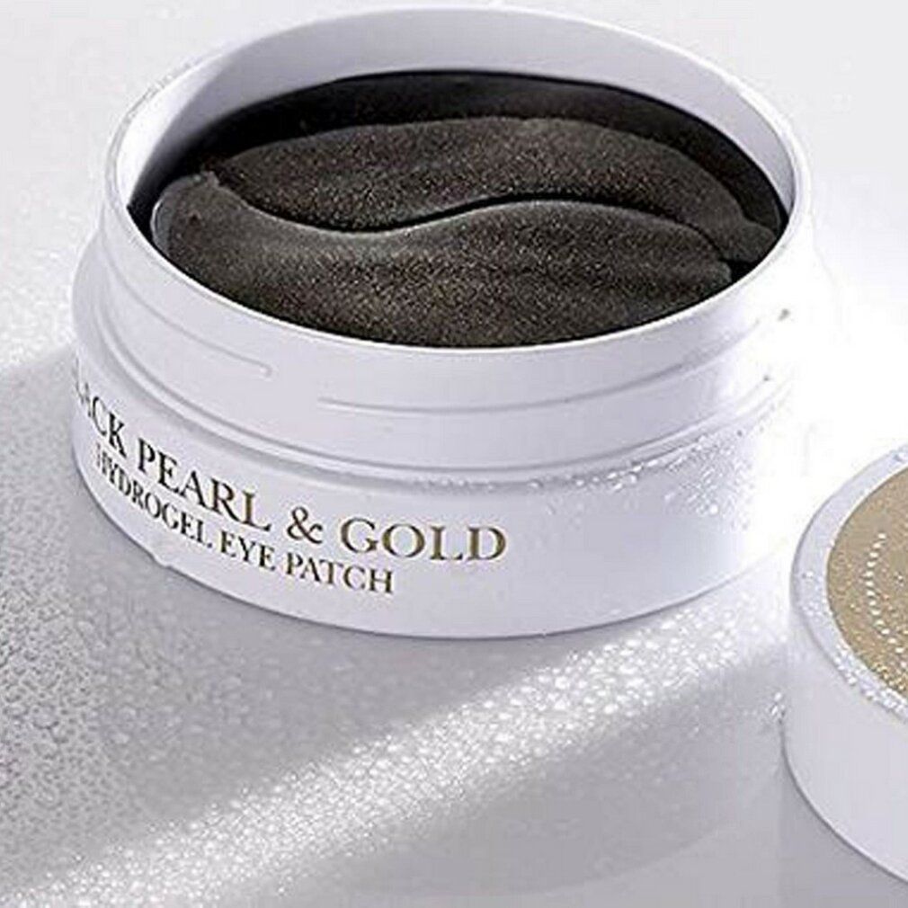 Geöffnete Dose mit schwarzen Hydrogel-Augenpflastern. Aufschrift: Black Pearl & Gold, Hydrogel Eye Patch.