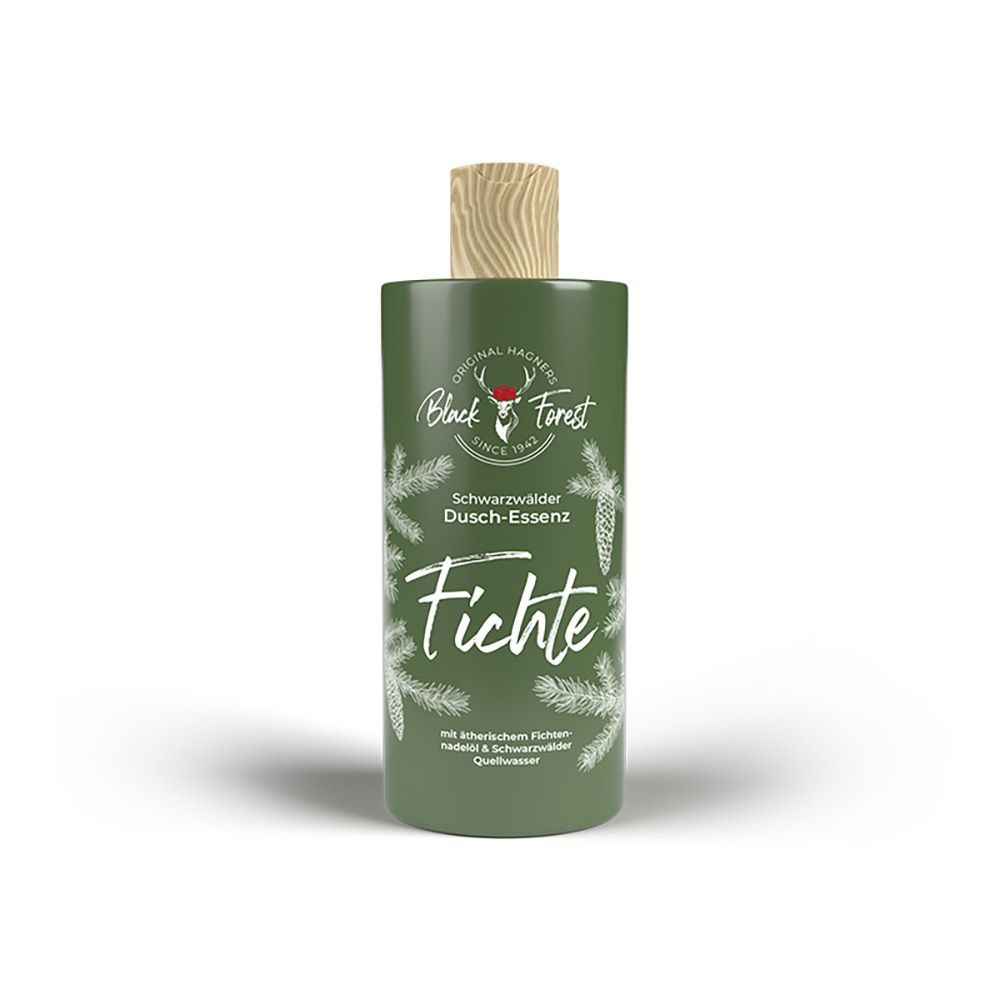 Grüne Flasche mit Holzverschluss. Aufschrift: Original Hagners Black Forest, Fichte. Mit Tannenzweigen dekoriert.
