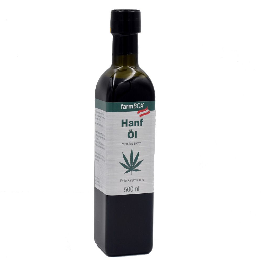 Dunkelgrüne Glasflasche mit schwarzem Verschluss. Etikett mit "farmBOX", "Hanf Öl", Cannabis-Blatt und Text. Flasche steht aufrecht.