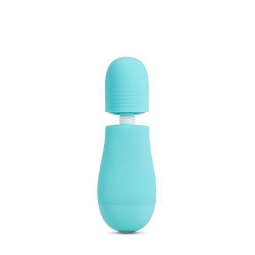 Türkisfarbener Vibrator mit abnehmbarem Aufsatz. Der Aufsatz ist zylindrisch, der Griff tropfenförmig.
