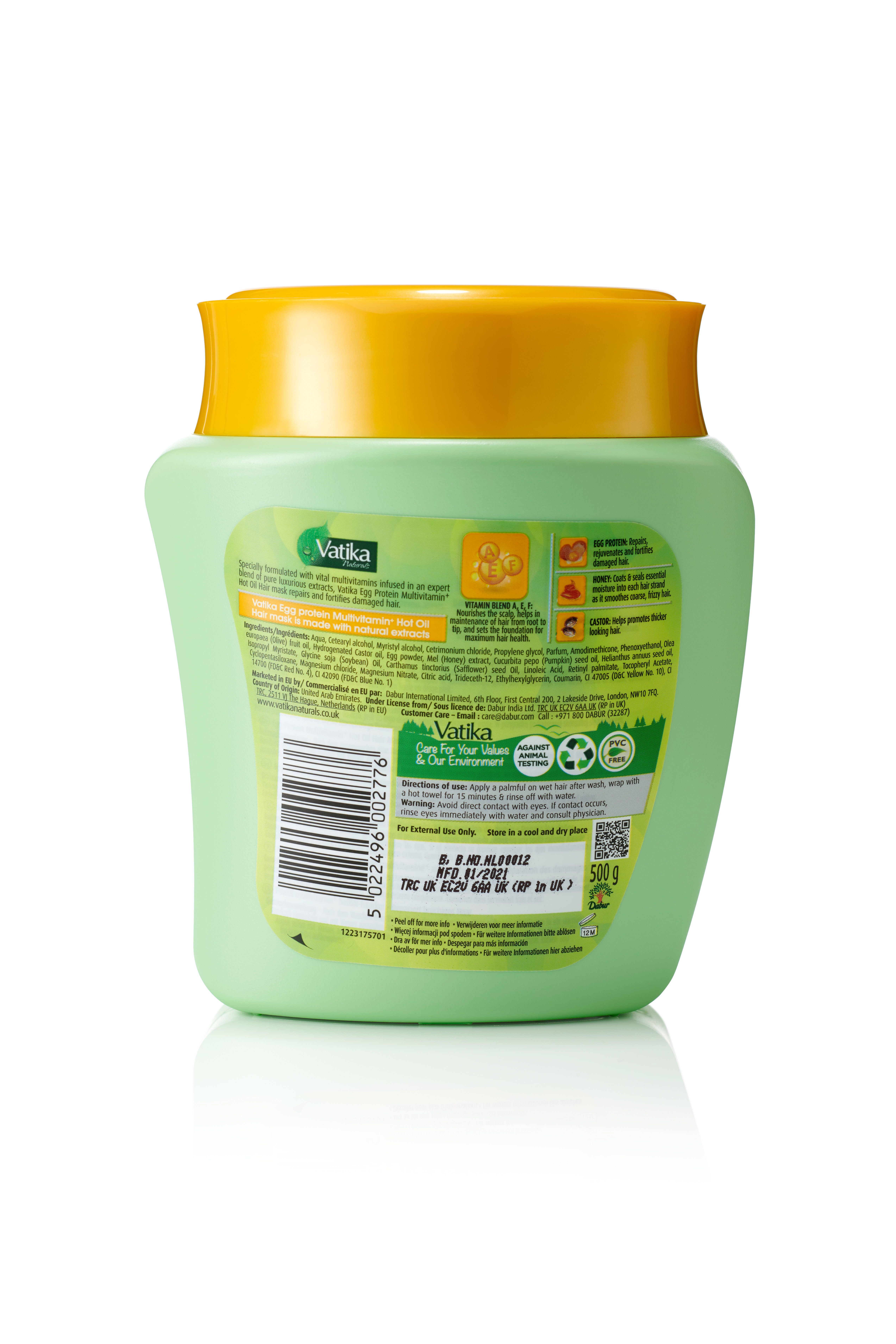 Rückseite einer grünen Haarmasken-Verpackung. Gelber Deckel. Text: Vatika Naturals, Inhaltsstoffe, Recycling-Symbol, Chargennummer, Mindesthaltbarkeitsdatum.
