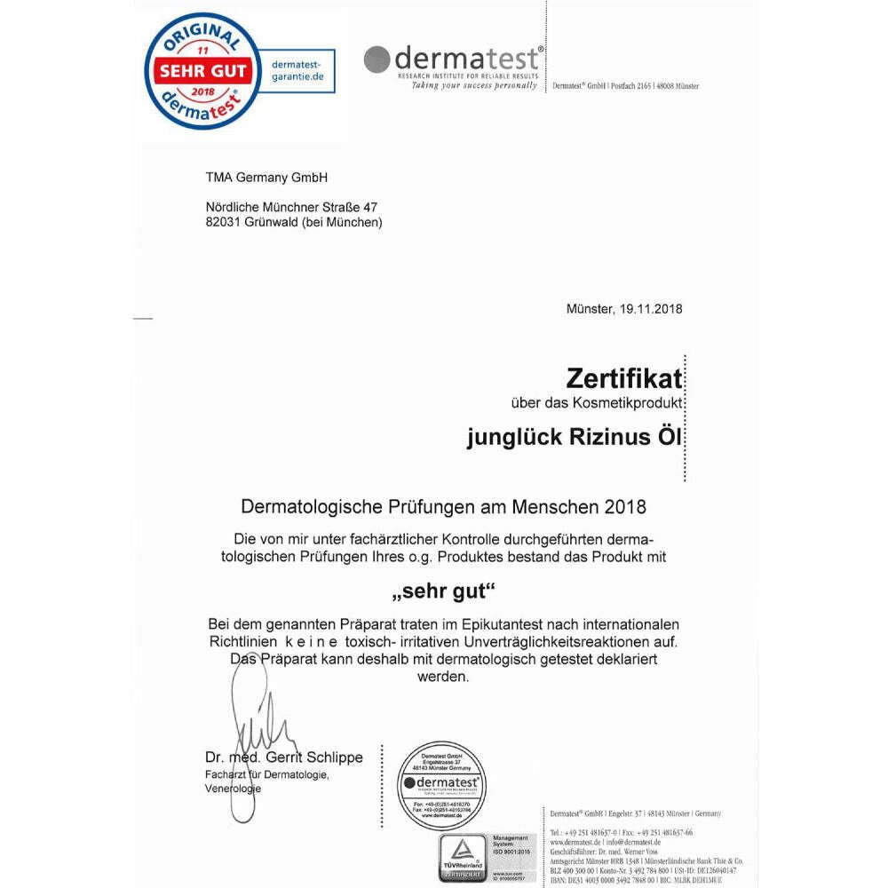 Zertifikat mit Logo und Text. Text: Zertifikat über das Kosmetikprodukt JUNGLÜCK Rizinusöl. Dermatologische Prüfungen: sehr gut.