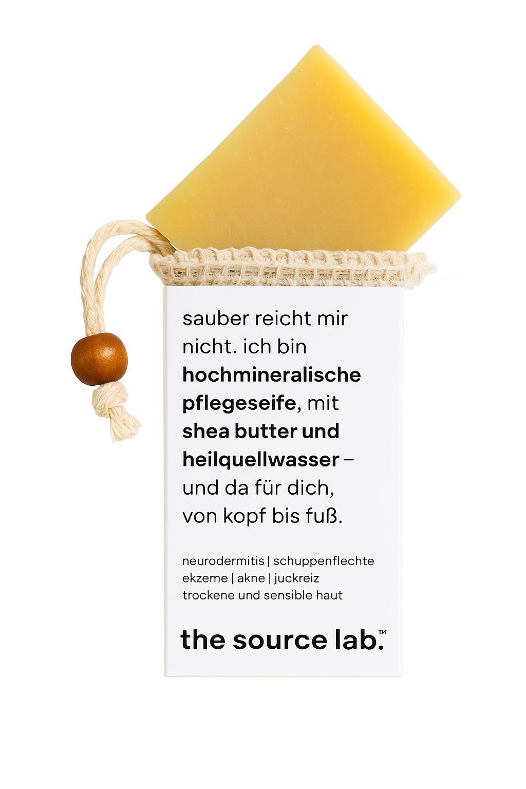 Produkt mit Seife und Beutel. Enthält Text über Inhaltsstoffe und Anwendungsbereiche. Marke: the source lab.