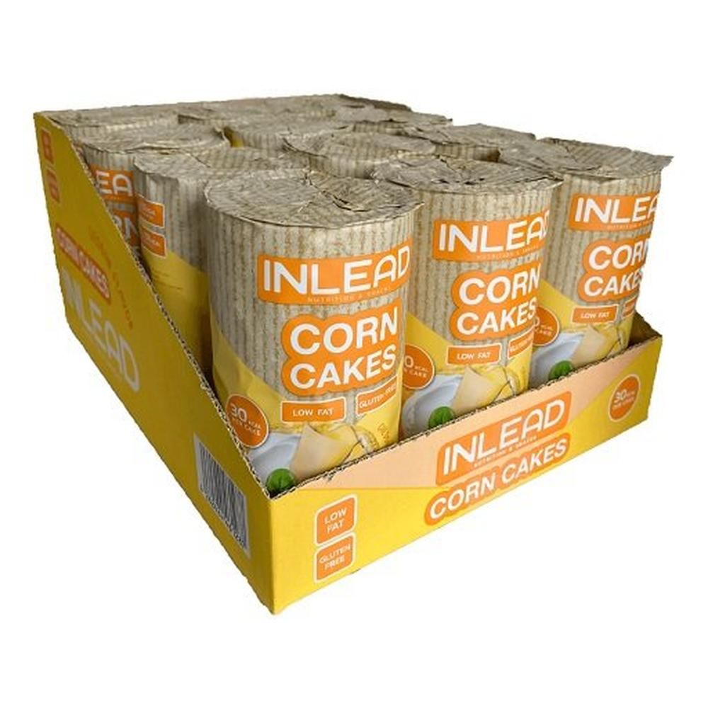 Gelbe Kartonverpackung mit zylindrischen Behältern. Aufschrift: INLEAD Corn Cakes. Glutenfrei, fettarm.