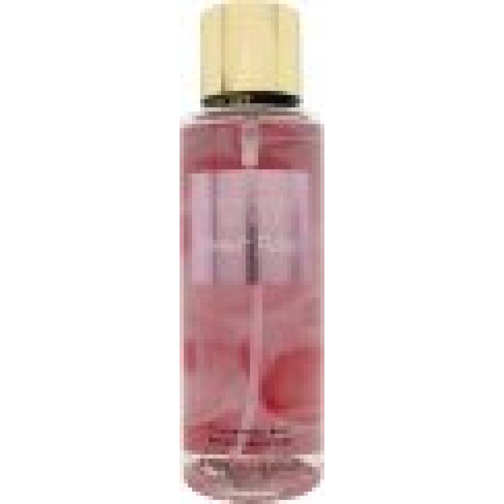 Eine Flasche Victoria's Secret Velvet Petals Fragrance Mist. Zylindrische Form, rosa Flüssigkeit, goldfarbener Deckel. Etikett mit Text.