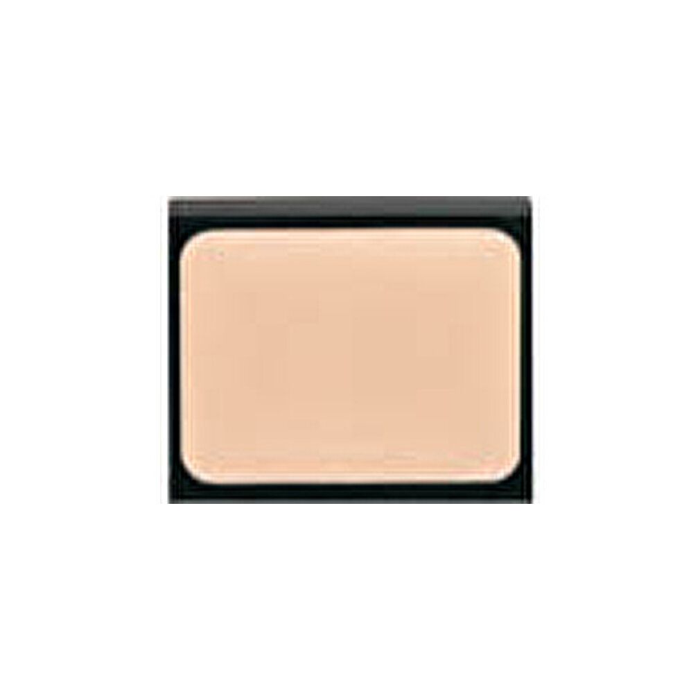 Beige Camouflage Cream in schwarzer, rechteckiger Dose. Abgerundete Ecken. Deckel geschlossen.