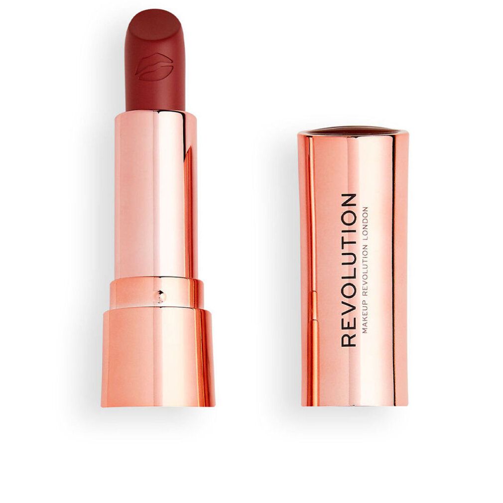 Lippenstift, geöffnet. Roségoldfarbene Hülse, roter Lippenstift. Auf der Hülse steht "REVOLUTION MAKEUP LONDON".