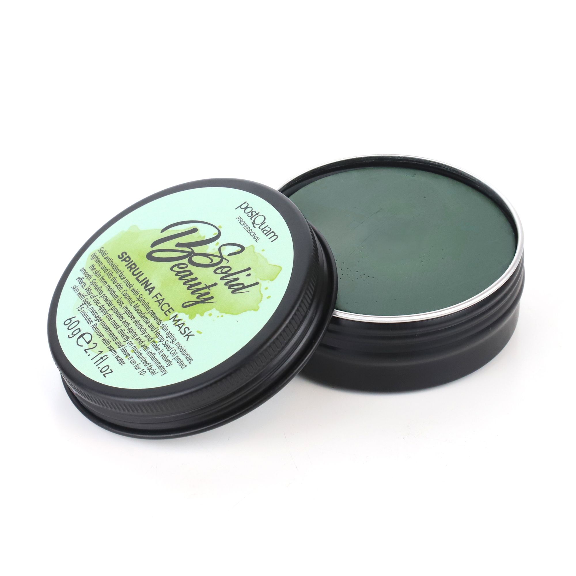 Offene Dose mit grüner Gesichtsmaske. Deckel mit Aufschrift 'Solid Beauty' und 'Spirulina Face Mask'. Schwarzer Behälter, grüne Maske.