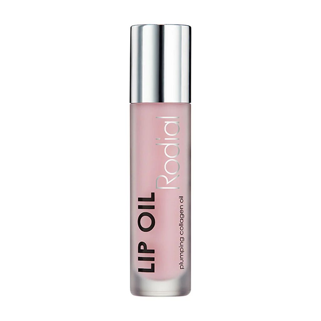 Lip Oil Flasche mit silbernem Deckel. Rosa Flüssigkeit, Produktname und "Rodial" Schriftzug.