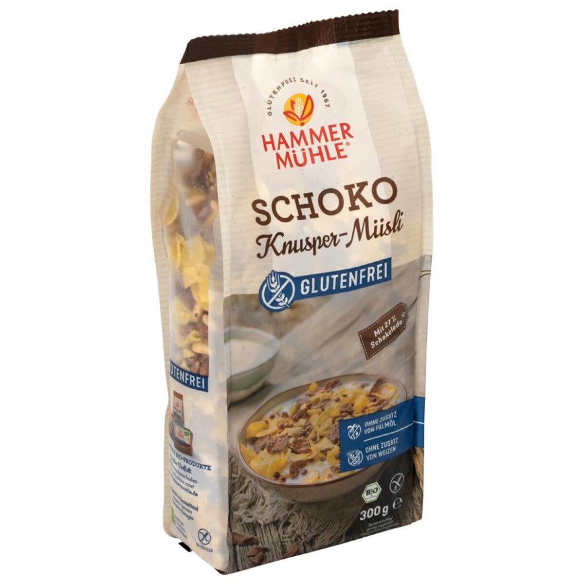 Verpackung Schoko Knusper-Müsli von Hammer Mühle. Glutenfrei. Abbildung von Müsli in einer Schüssel. Bio-Siegel.