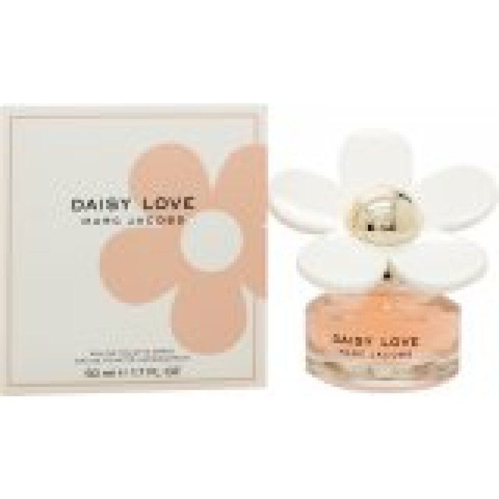 Parfümflakon und Verpackung. Flakon mit weißer Blüte. Aufschrift: Daisy Love, Marc Jacobs. Verpackung mit Blüte.