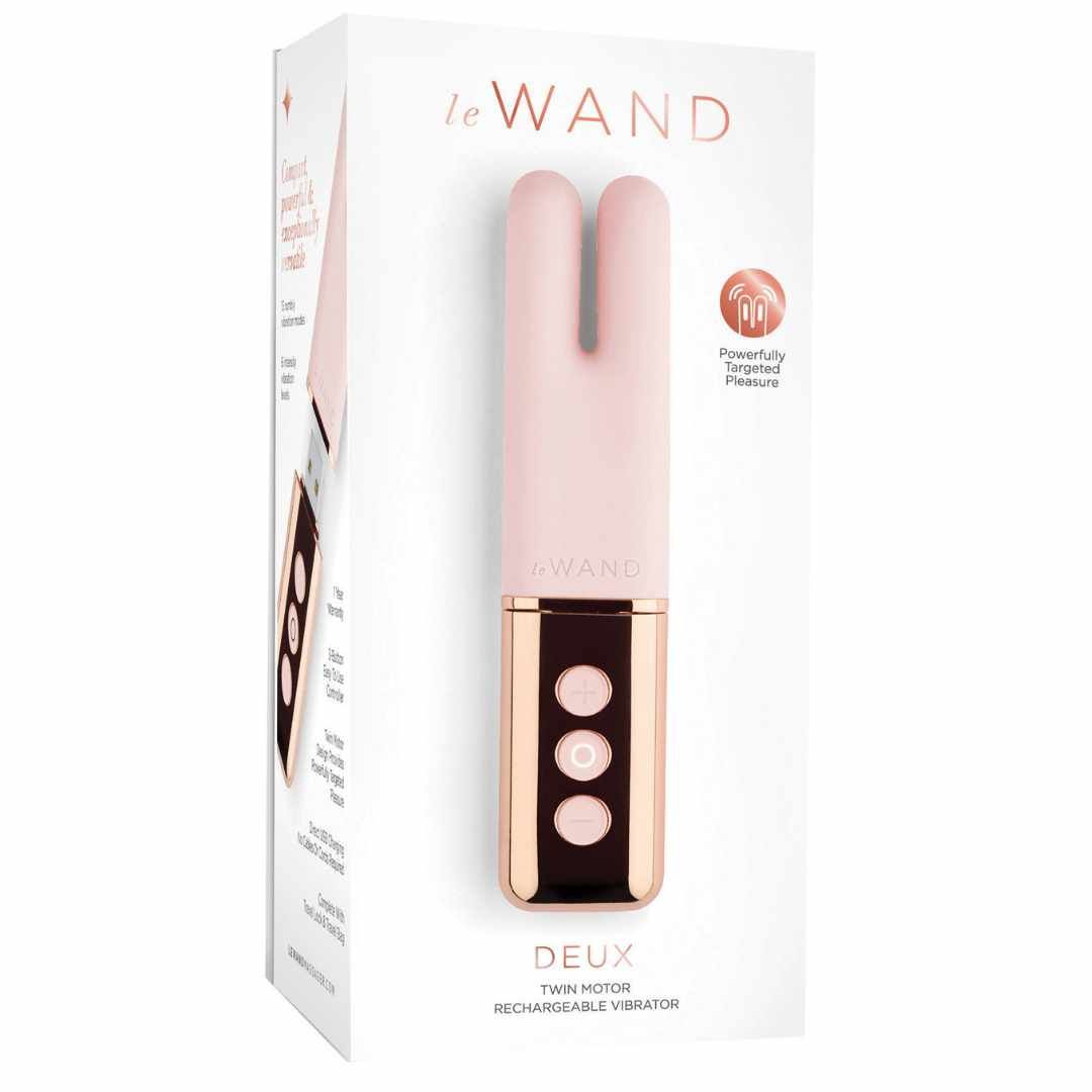 Rosa Vibrator in Verpackung. Verpackung mit Produktbild und Text: Le Wand, Deux, Twin Motor.