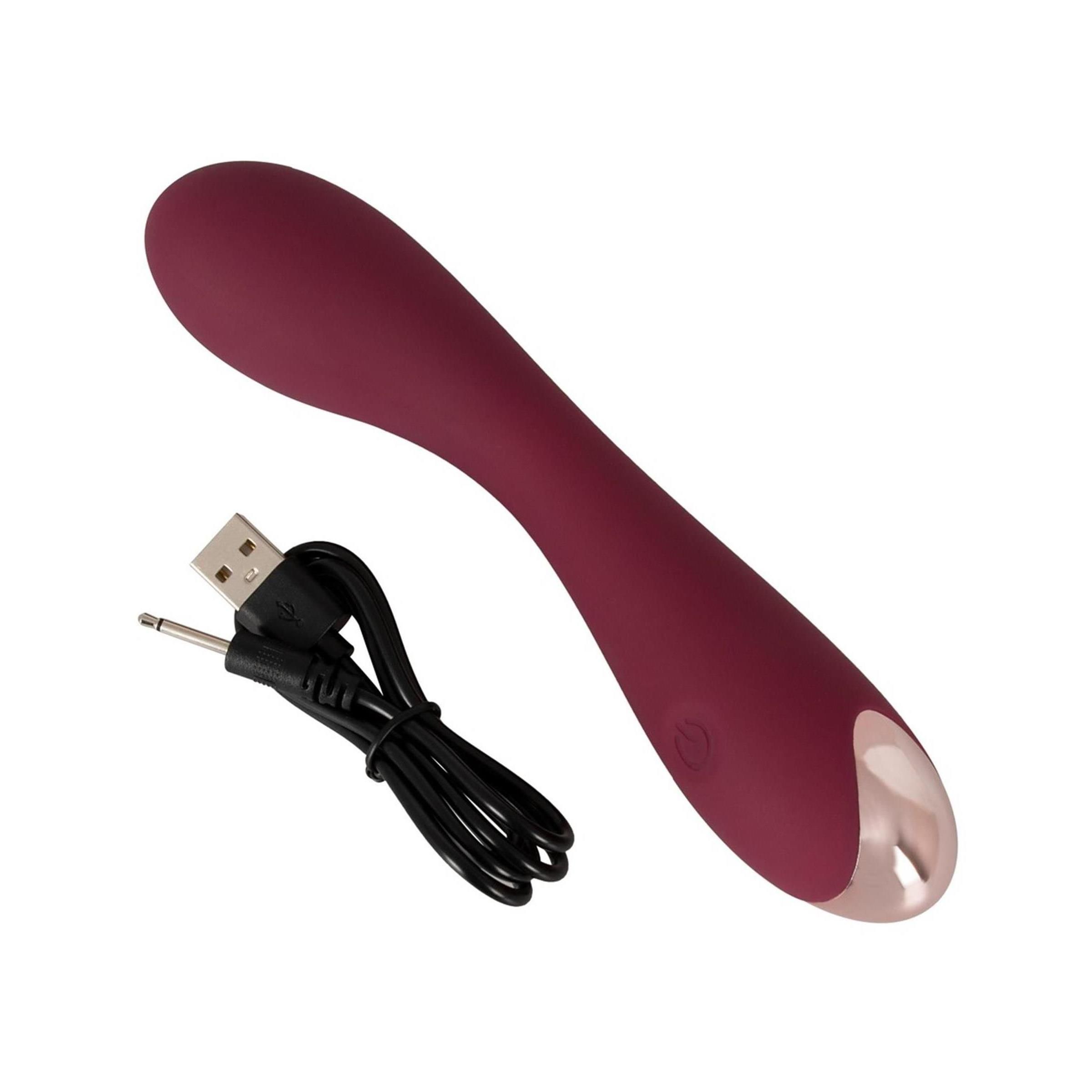 Burgunderfarbener Vibrator mit USB-Ladekabel. Metallspitze und Bedienknopf.