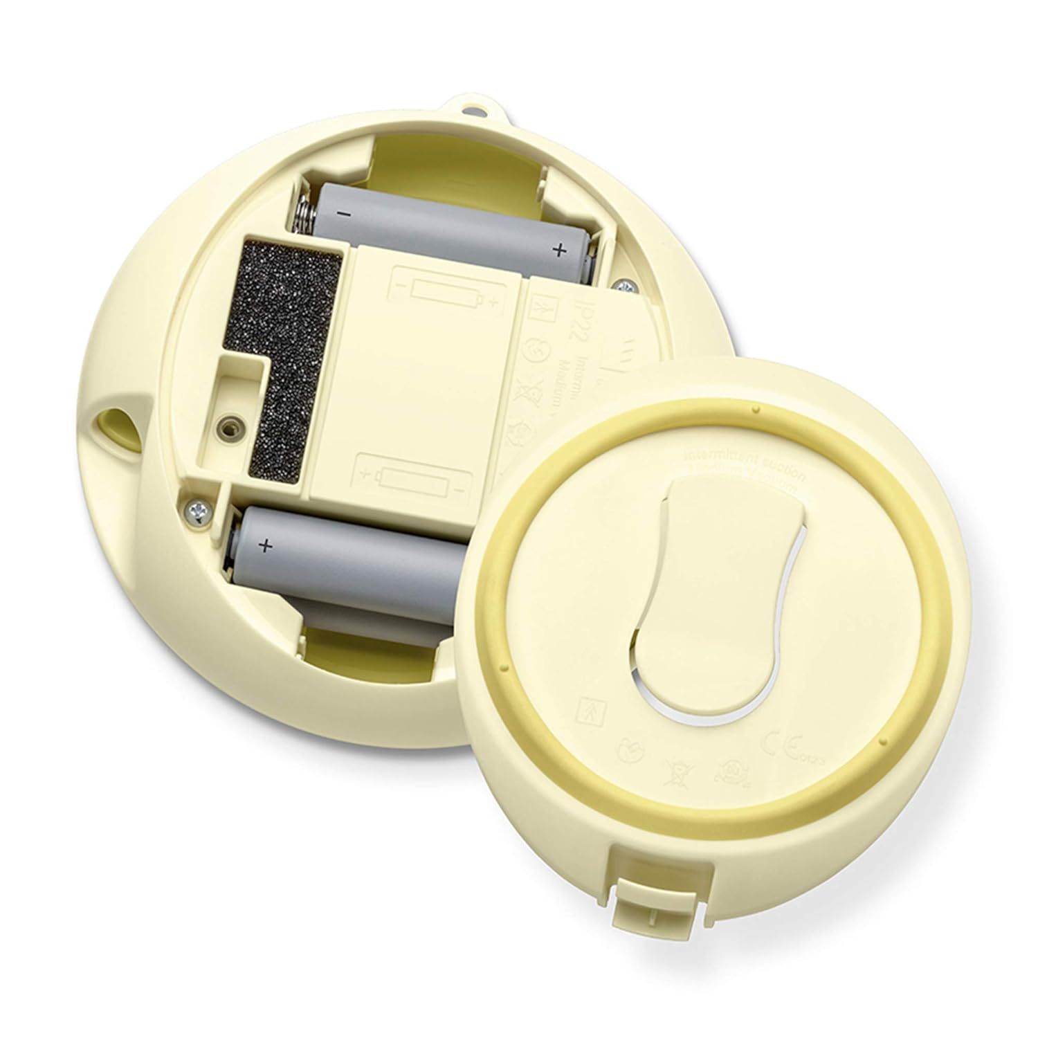 Geöffnete elektrische Milchpumpe. Zeigt Batteriefach mit Batterien. Gelb-weißes Design.