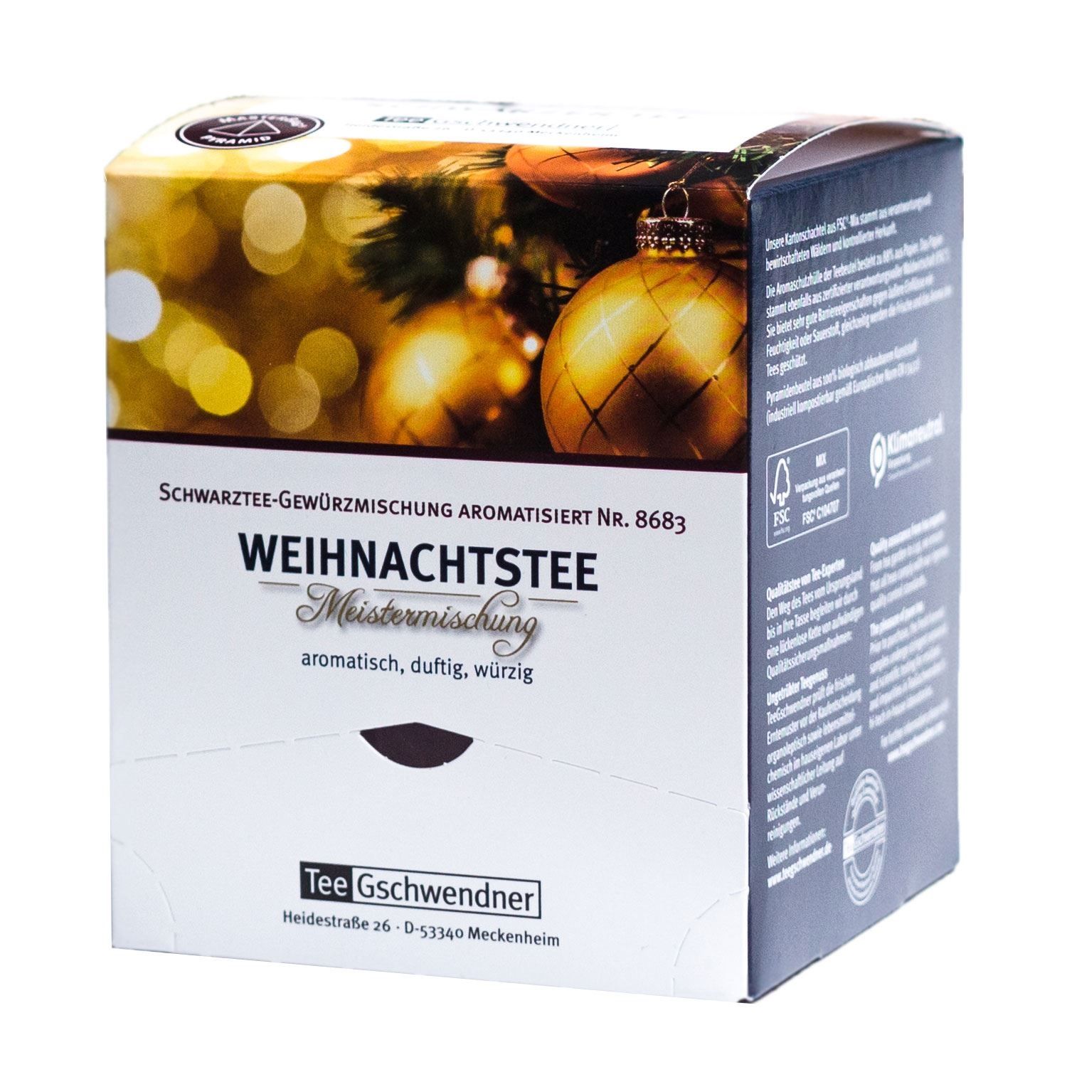 Weihnachtstee-Verpackung. Schwarzer Tee mit Gewürzmischung. Text: Weihnachtstee Meistermischung, aromatisch, duftig, würzig. Marke: Tee Gschwendner.
