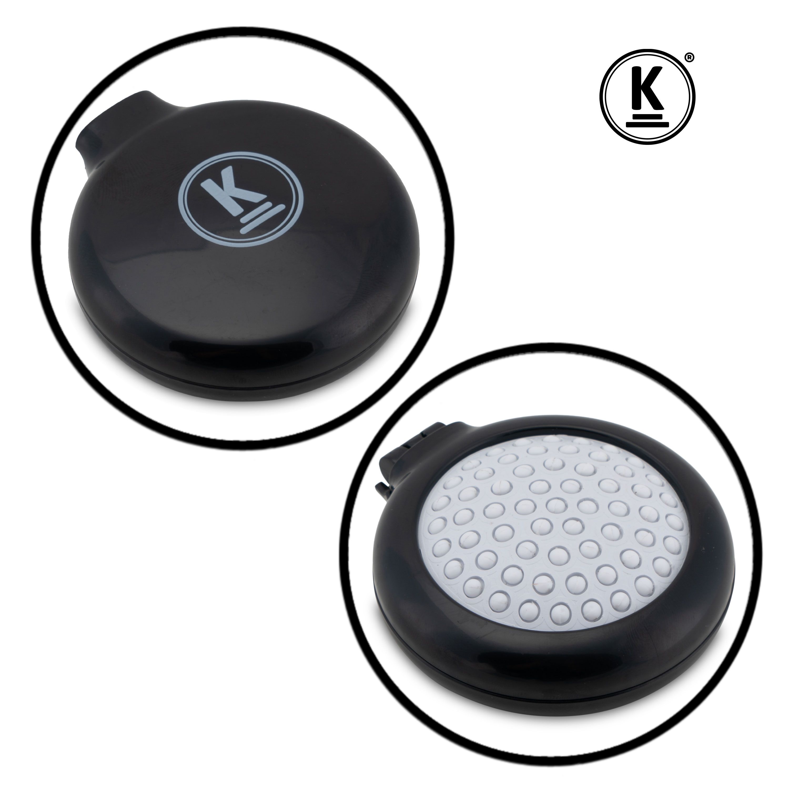 Zwei runde, schwarze Bürsten. K-Logo auf einer Seite. Bürsten auf der anderen Seite. K-Logo oben rechts.