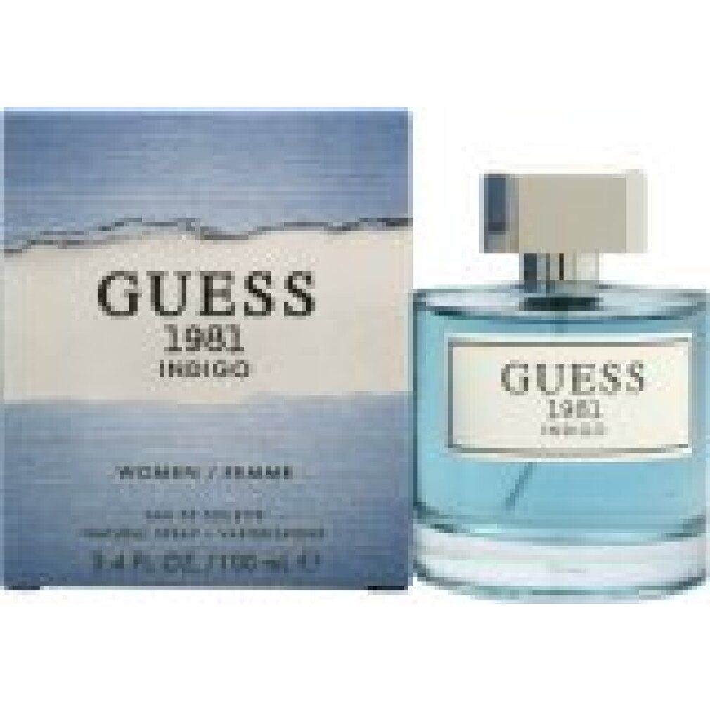 Parfümflakon und Schachtel. Aufschrift "GUESS 1981 INDIGO". Blaue Verpackung.