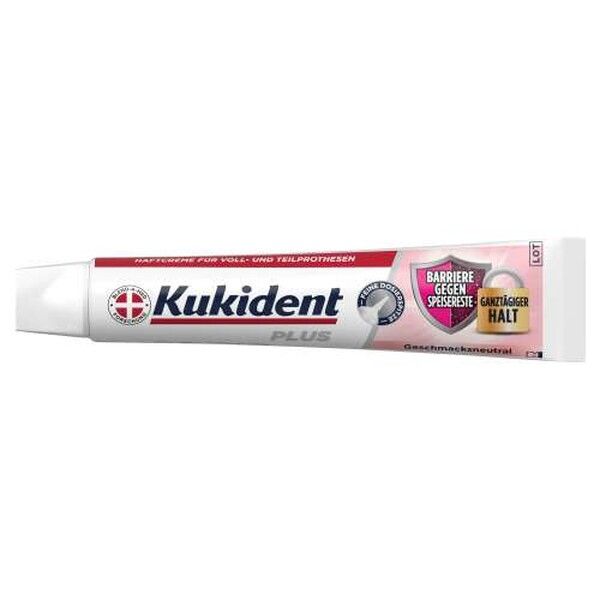Kukident Plus Haftcreme Tube mit Siegel und Schloss-Symbol für "ganztägigen Halt".