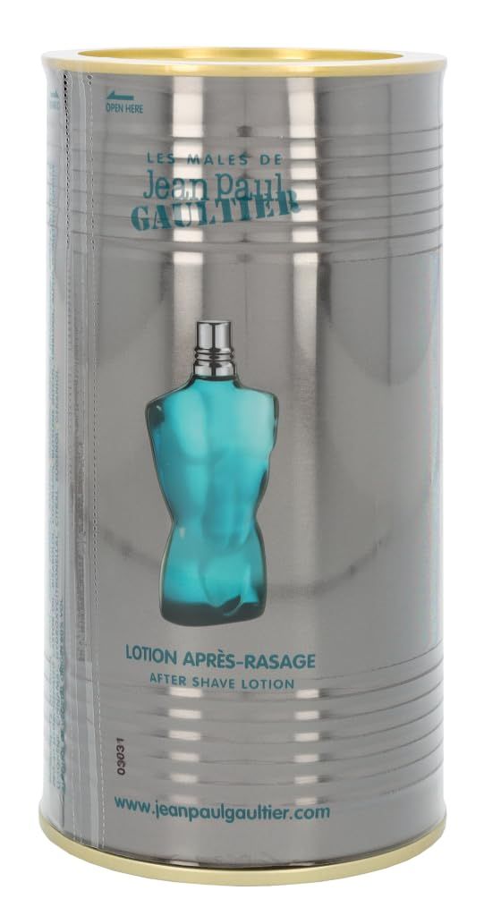Zylindrische Dose mit Flasche in Form eines Torsos. Aufschrift: Jean Paul Gaultier, Lotion Après-Rasage. www.jeanpaulgaultier.com.
