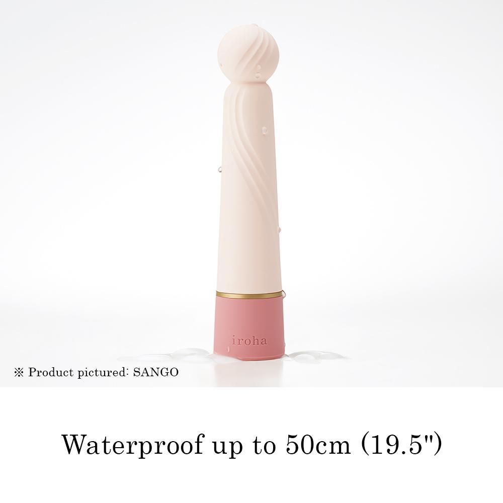 Beiger Vibrator mit rosa Unterteil. Geriffelte Oberfläche, abgerundeter Kopf. Goldener Ring. Aufschrift "iroha". Text: Wasserdicht bis 50cm.