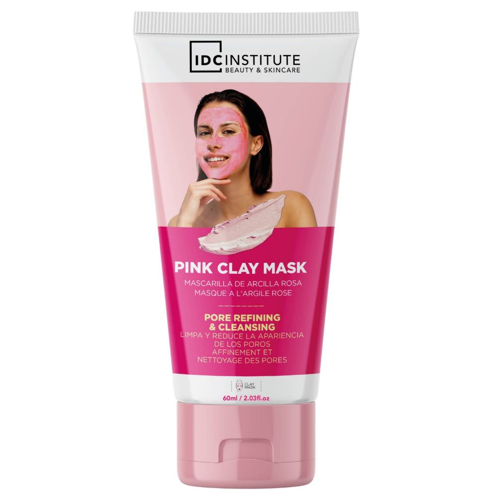 Rosa Tonerde-Maske in Tube. Aufdruck: IDC INSTITUTE, Pink Clay Mask, Pore Refining & Cleansing. Frau mit Maske abgebildet.