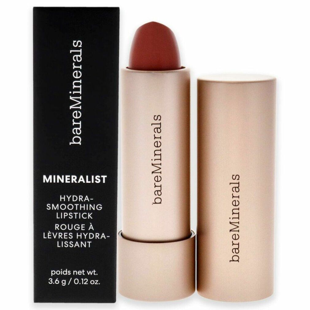 Lippenstift in Goldhülse, neben schwarzer Verpackung. Marke: bareMinerals, Produktname: Mineralist Hydra-Smoothing Lipstick.
