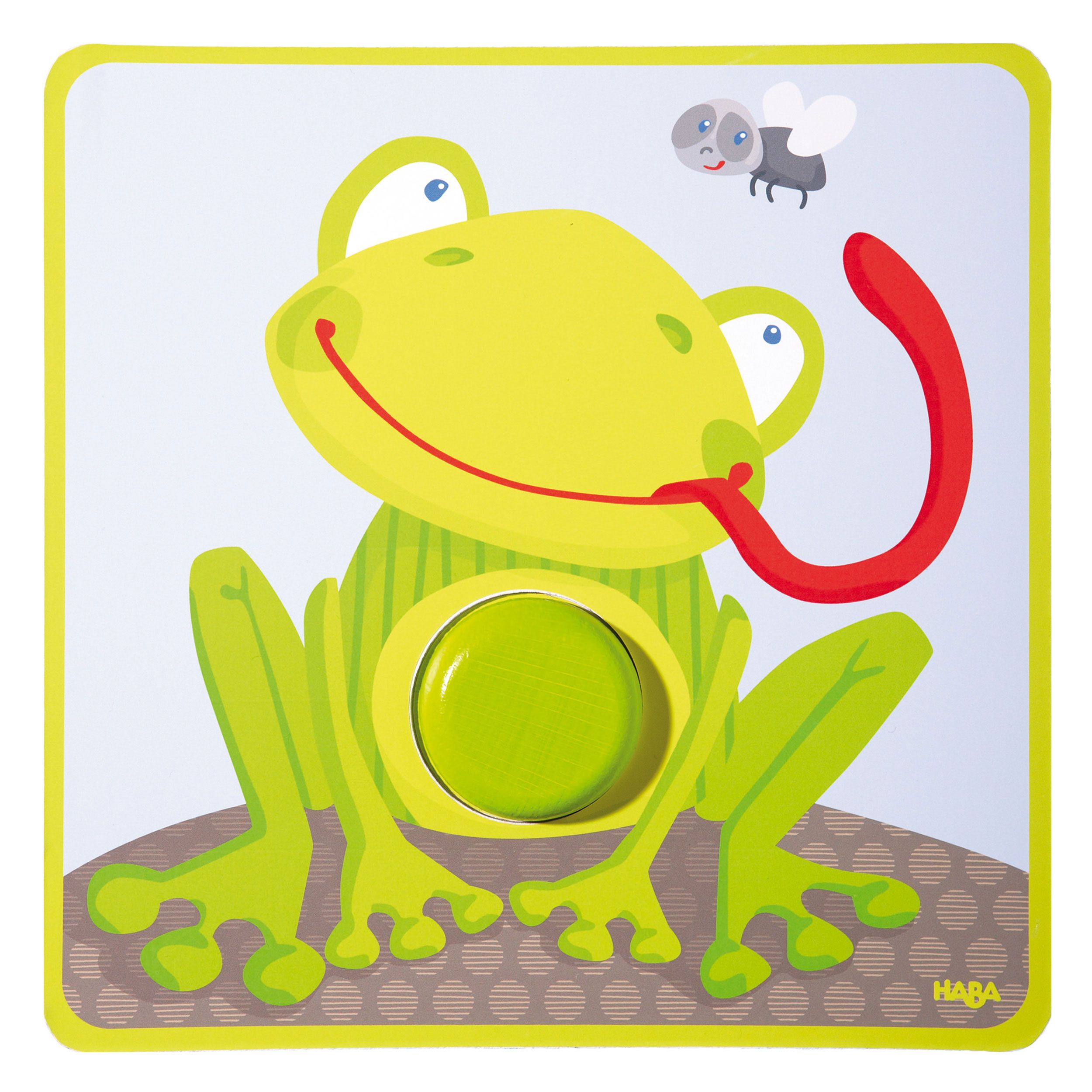 Spielkarte mit Frosch-Illustration. Ein grüner Knopf und eine Zunge sind sichtbar. HABA-Logo.