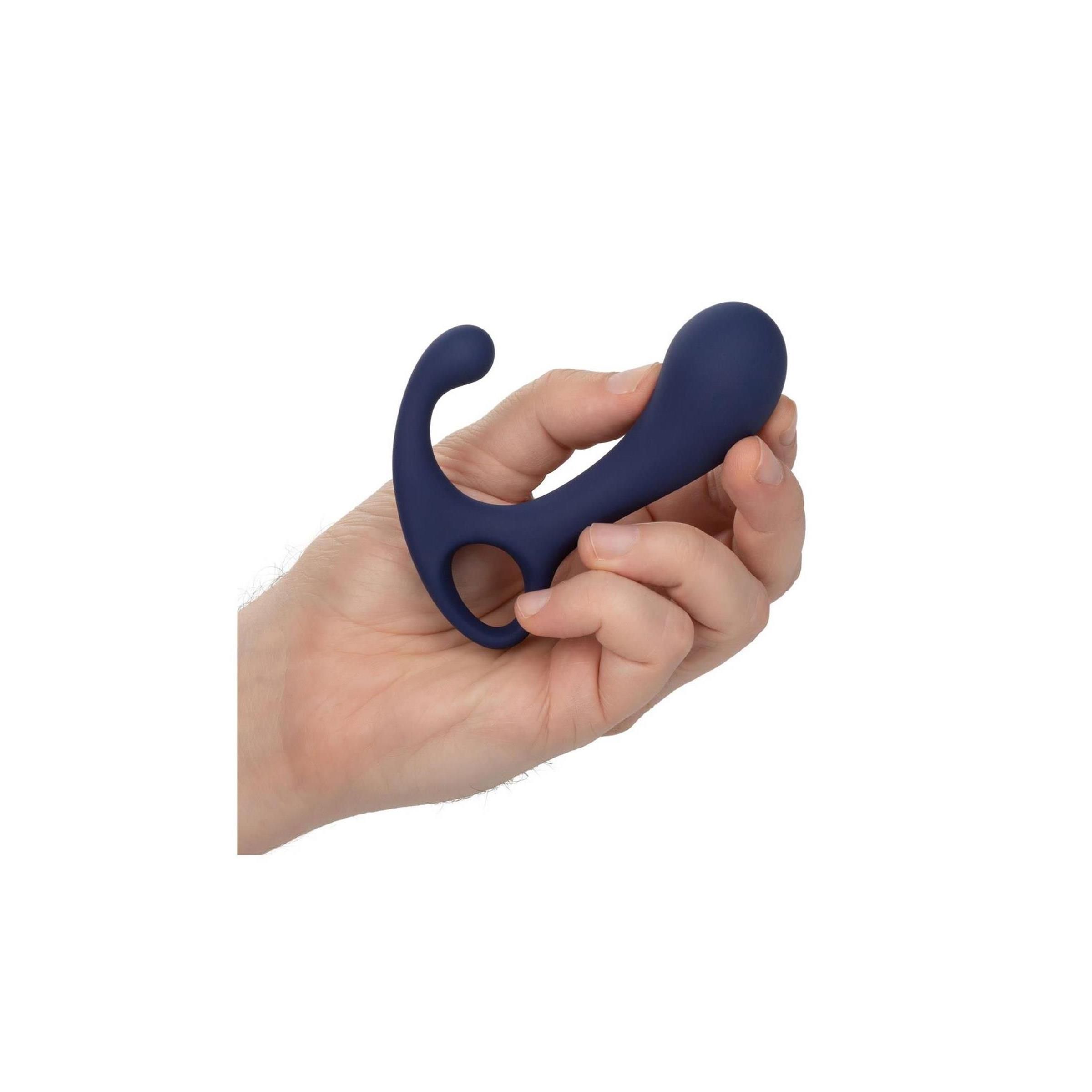 Dunkelblaue, ergonomisch geformte Silikon-Probe in einer Hand gehalten. Keine weitere Verpackung sichtbar.
