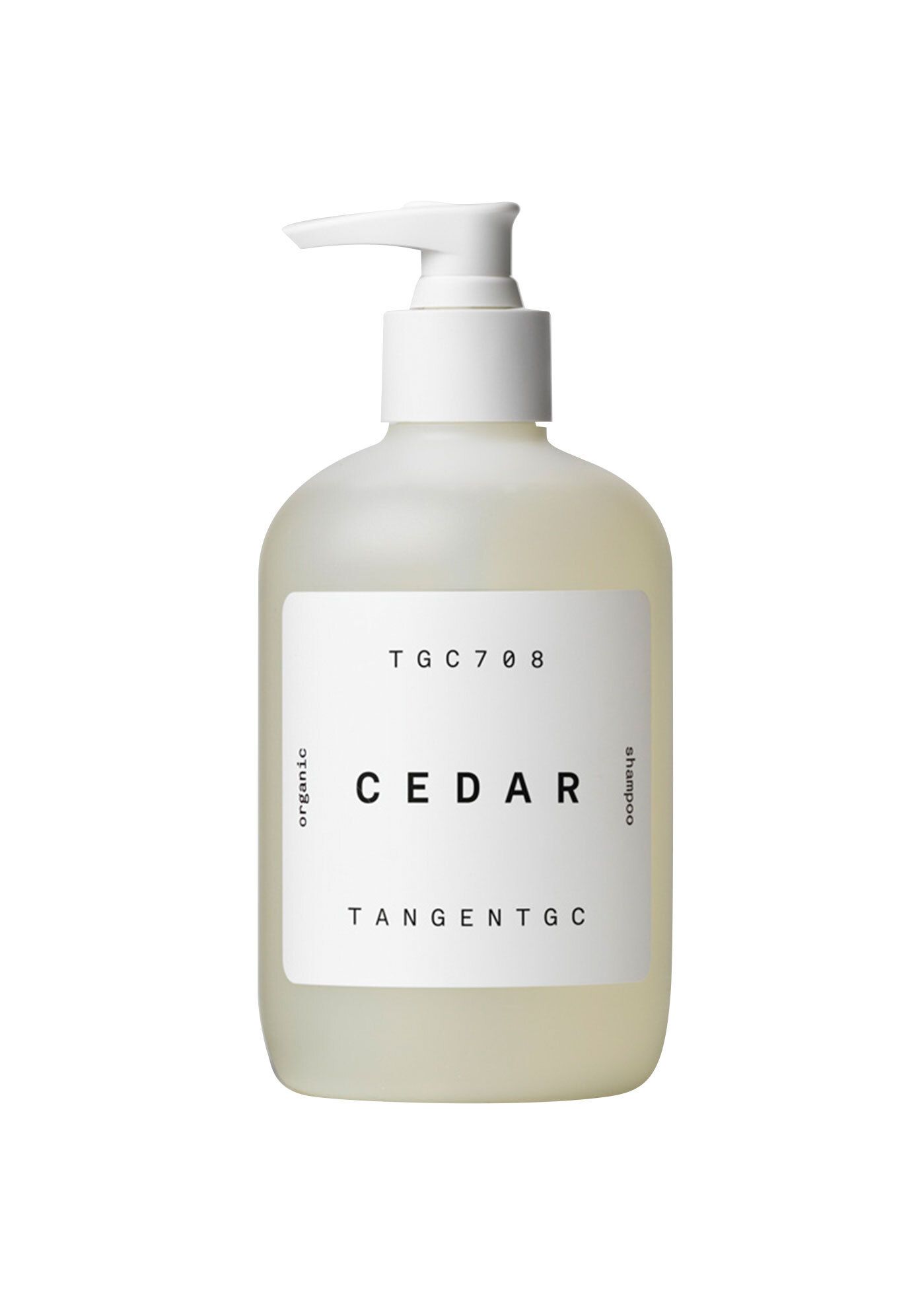 Eine Flasche Shampoo mit weißem Pumpkopf. Auf dem Etikett steht "CEDAR" und "TANGENTGC".