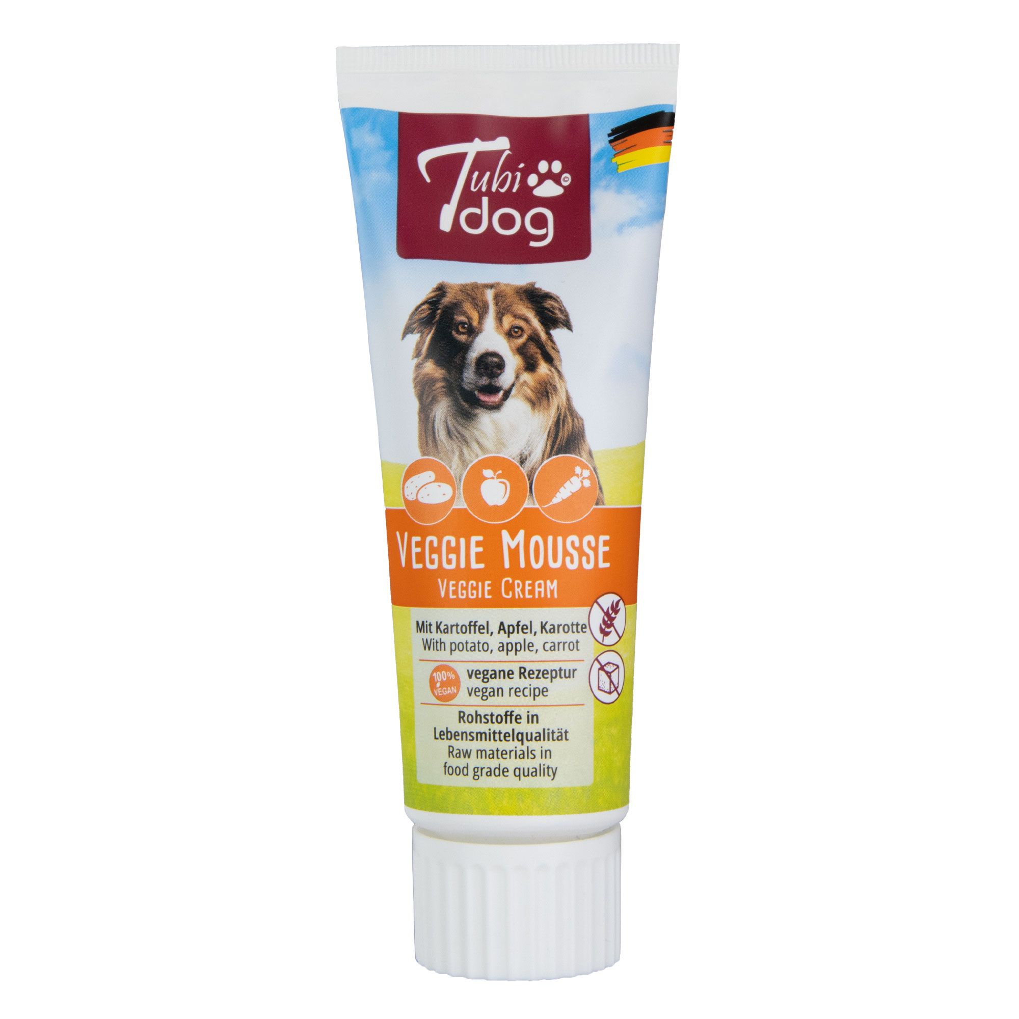 Tube mit "Tubi dog Veggie Mousse". Abbildung eines Hundes, Kartoffel, Apfel, Karotte. Vegan Rezeptur. Rohstoffe in Lebensmittelqualität.