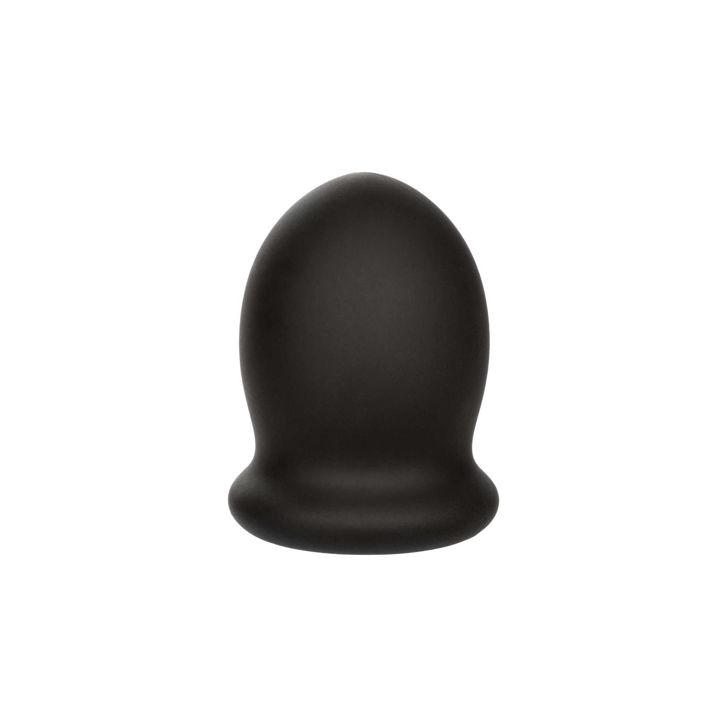 Schwarzes, eiförmiges Produkt mit breitem Sockel. Glatte Oberfläche. Wellness-Produkt.