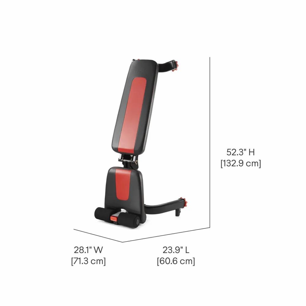 Zusammengeklappte Trainingsbank mit Maßen: 60,6 cm lang, 71,3 cm breit, 132,9 cm hoch. Schwarz mit roten Akzenten. Verstellbar.