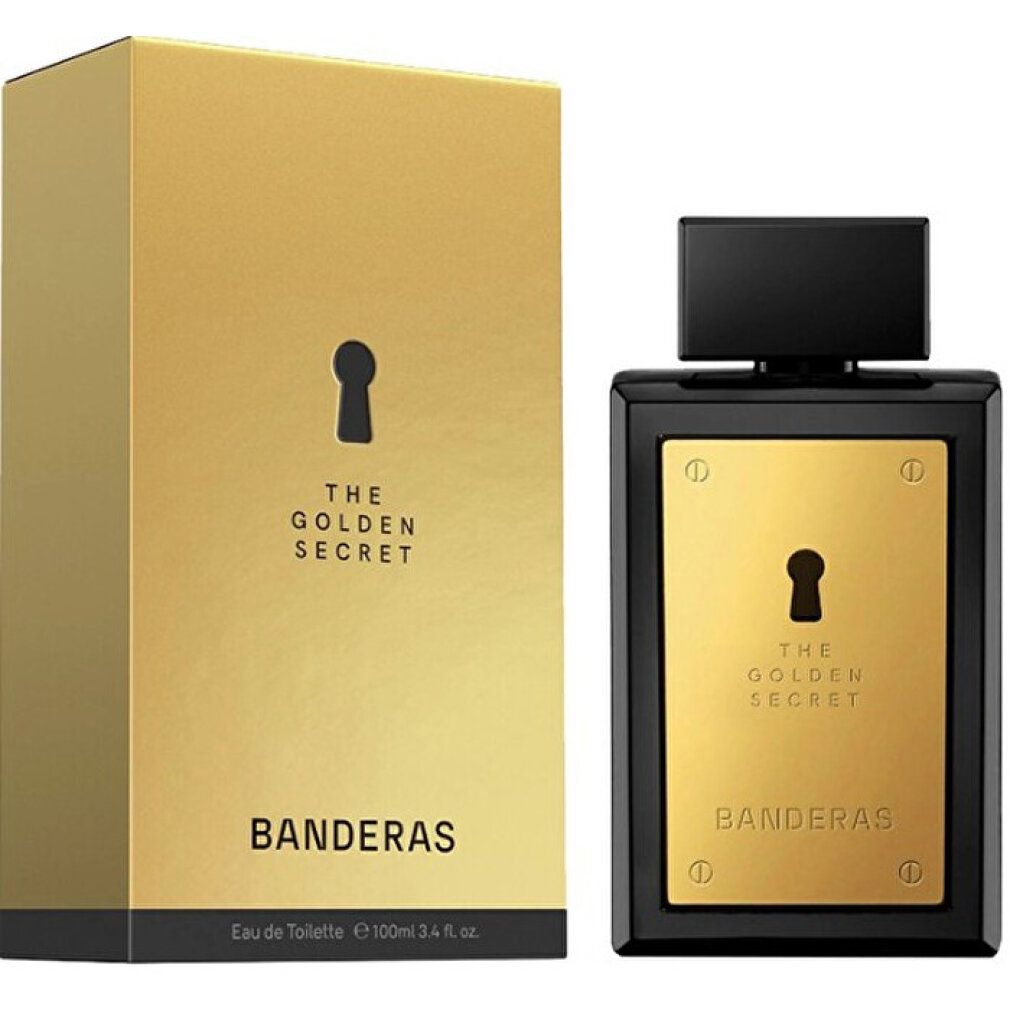 Flakon und Verpackung. Schwarzer Flakon mit goldener Platte. Goldene Verpackung mit Schlüsselmotiv.