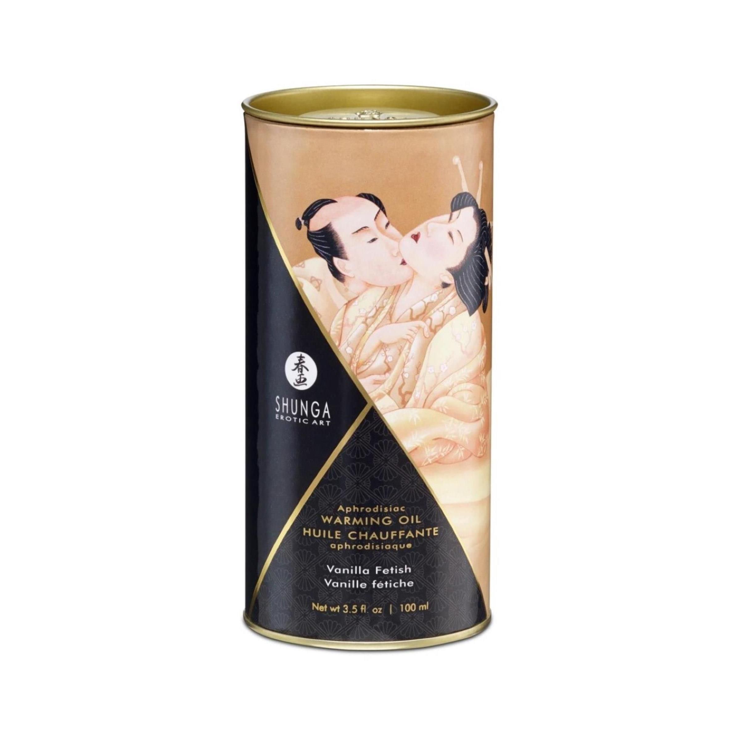 Zylindrische Verpackung mit Bild. Text: Shunga, Warming Oil, Vanilla Fetish. Goldener Deckel, schwarzer Hintergrund.