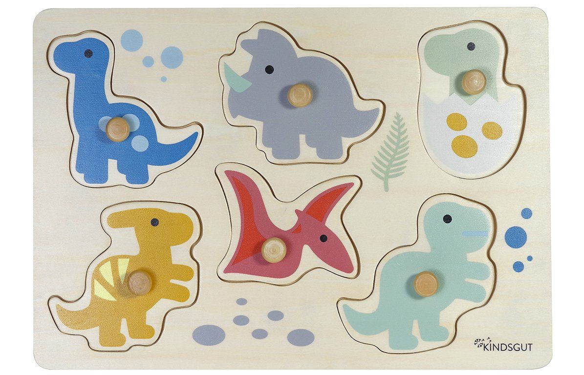 Holzpuzzle mit sechs bunten Dinosauriern. Jedes Puzzleteil hat einen Knauf. Das Kindsgut-Logo ist unten rechts.