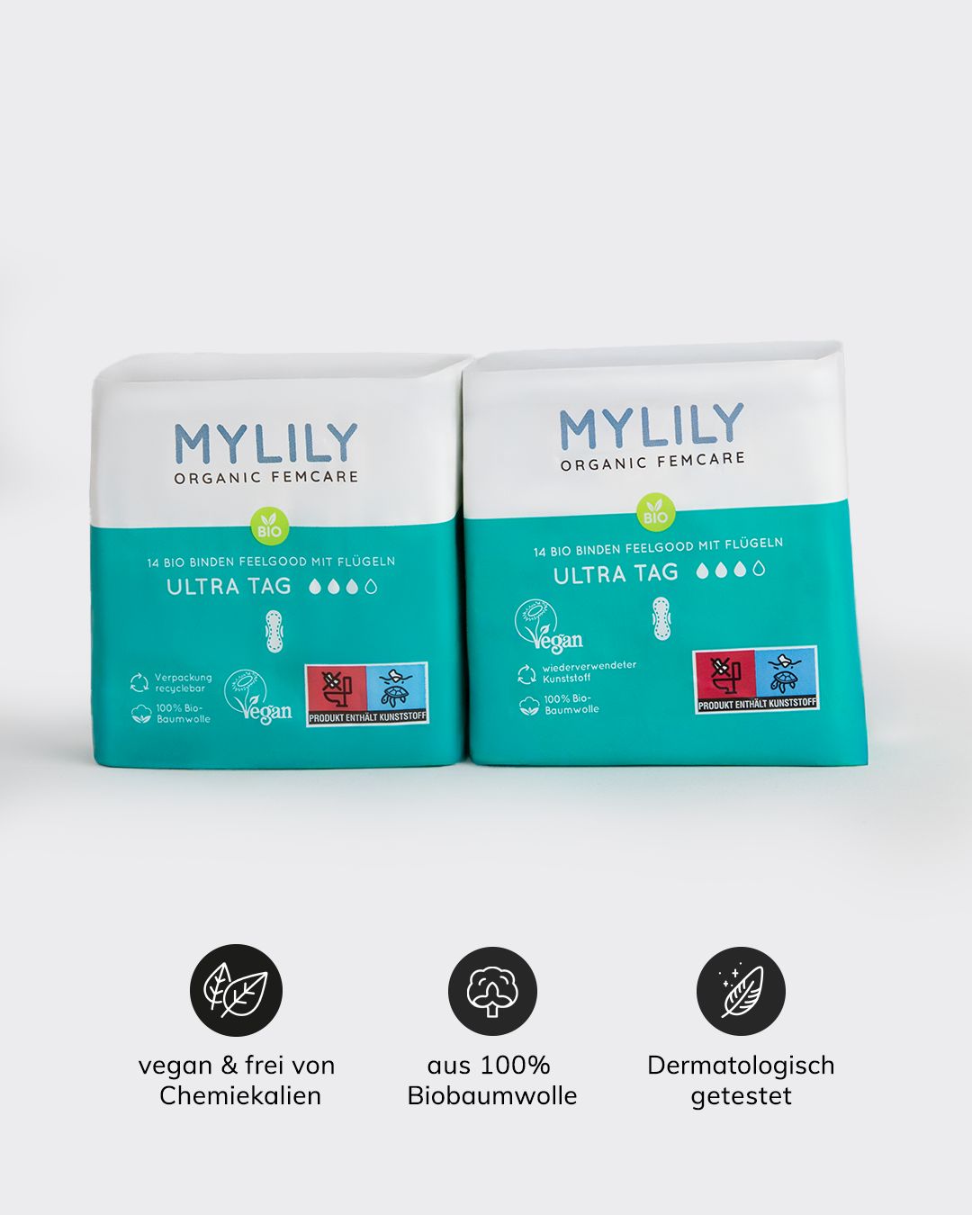 Zwei Packungen MYLILY Binden. Aufdrucke: MYLILY, Ultra Tag, Vegan, Bio, 100% Biobaumwolle, dermatologisch getestet. Grün, weiß, blau.