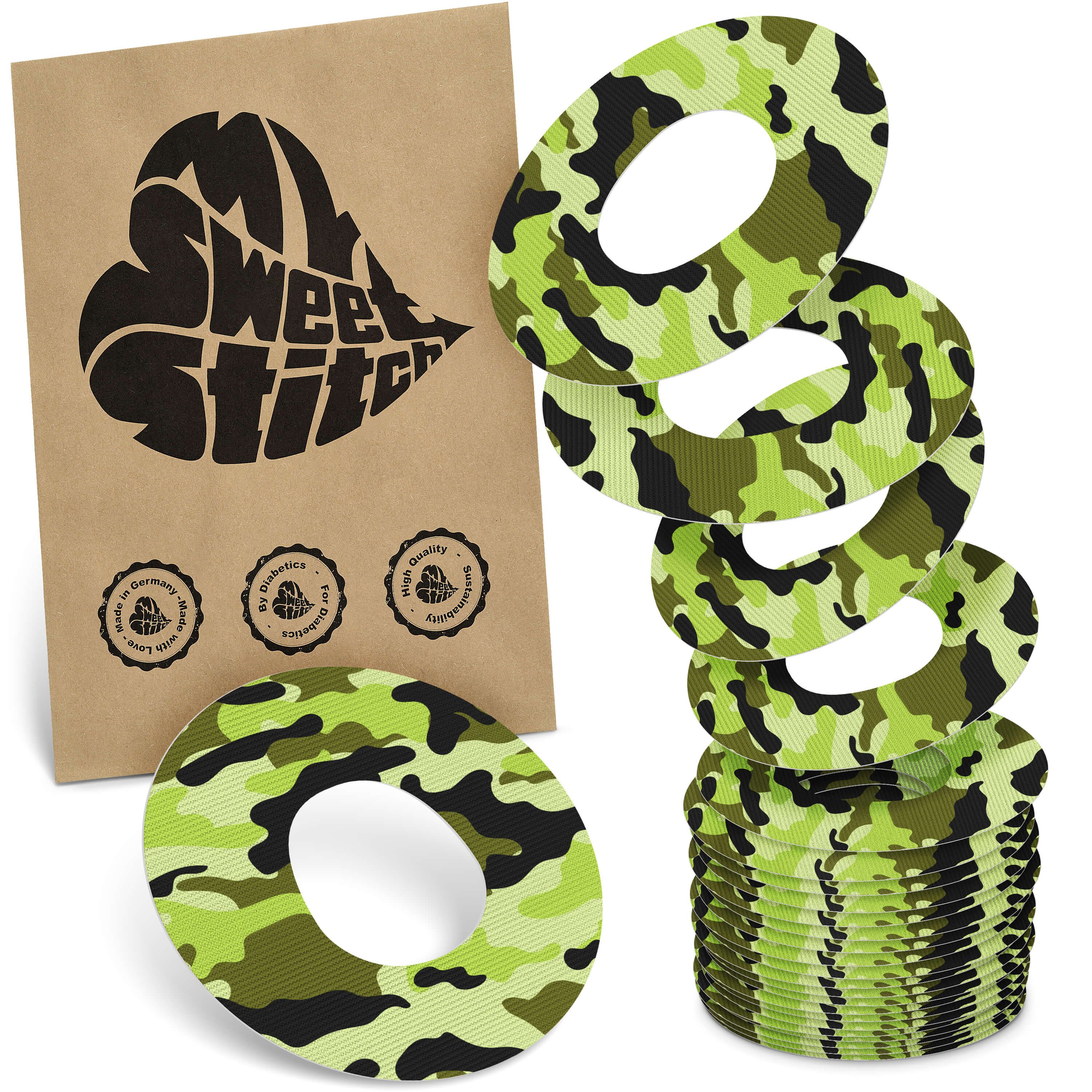 Fixierpflaster mit Camouflage-Muster. Braune Verpackung mit Logo 'MySweetStitch'. Siegel mit Text.