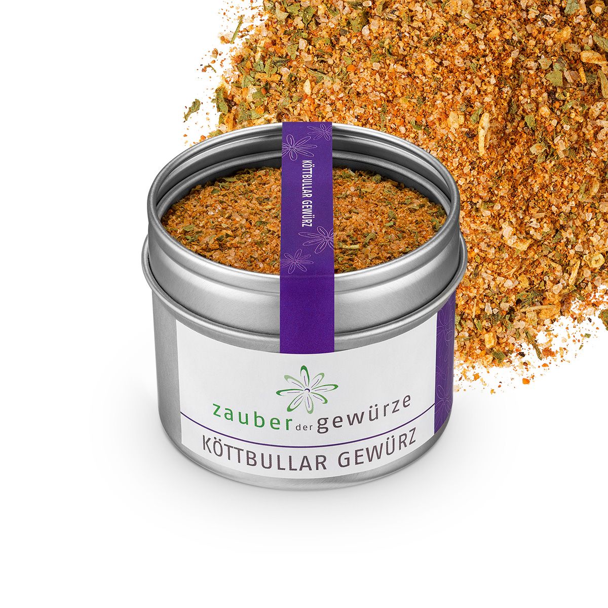 Gewürzdose mit Aufschrift 'Zauber der Gewürze Köttbullar Gewürz'. Dose und lose Gewürze daneben.