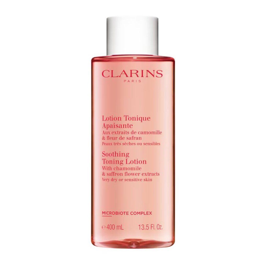 Transparente rosa Flasche mit weißem Deckel. Aufschrift: CLARINS PARIS. Text: Lotion Tonique Apaisante. Mit Kamille & Safranblütenextrakten. 400 ml.