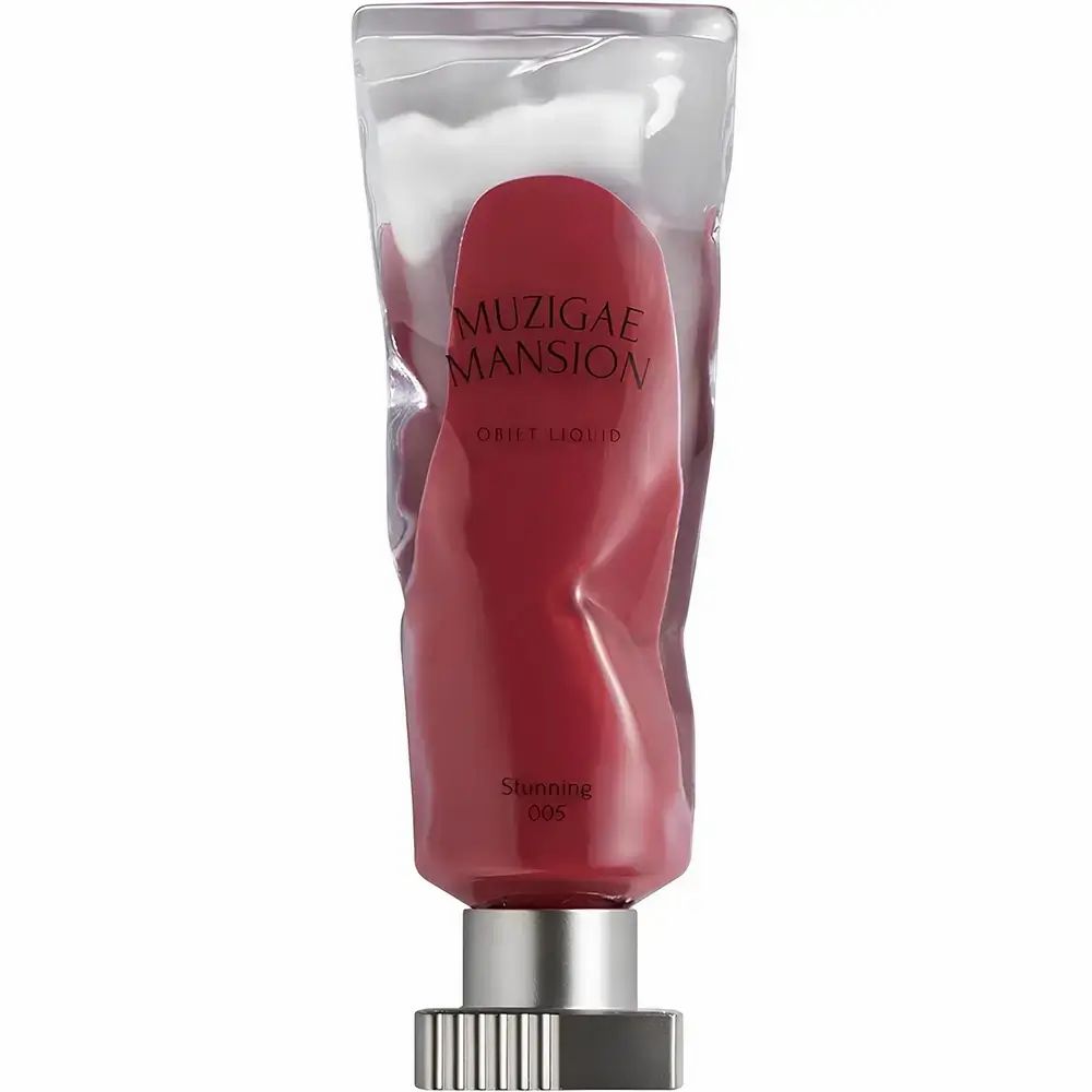 MUZIGAE MANSION Objet Liquid Lip Tint in transparenter Verpackung. Rote Farbe. Text: Stunning 005.