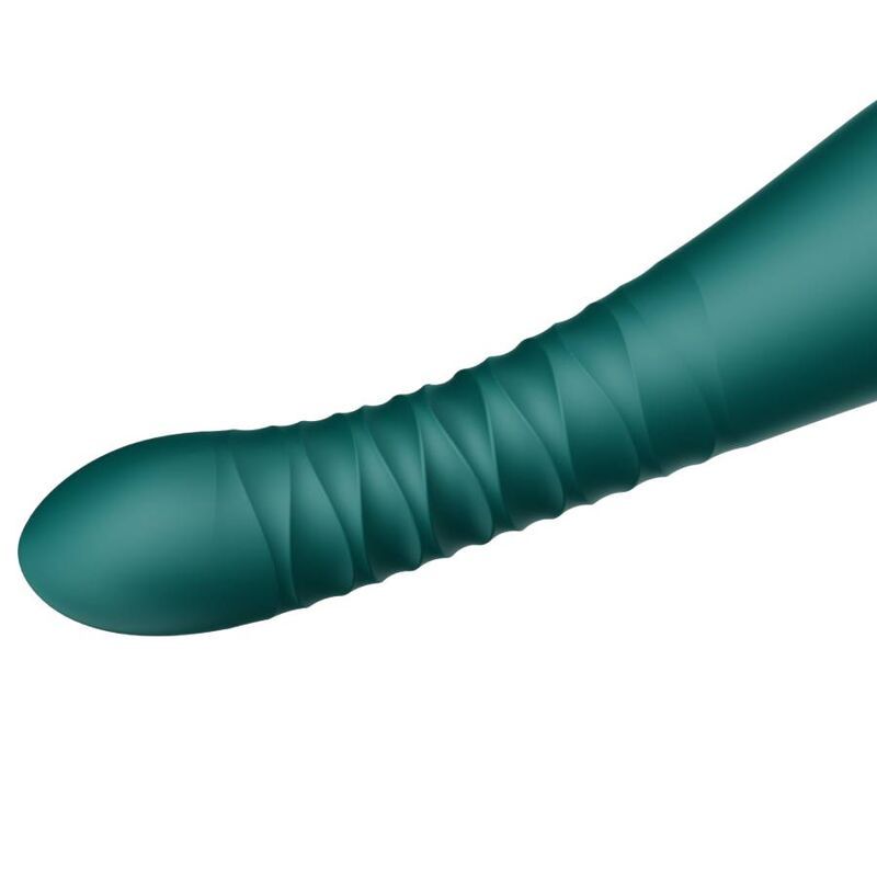 Nahaufnahme des Vibrator-Schafts. Türkis mit geriffelter Textur. Abgerundete Spitze.