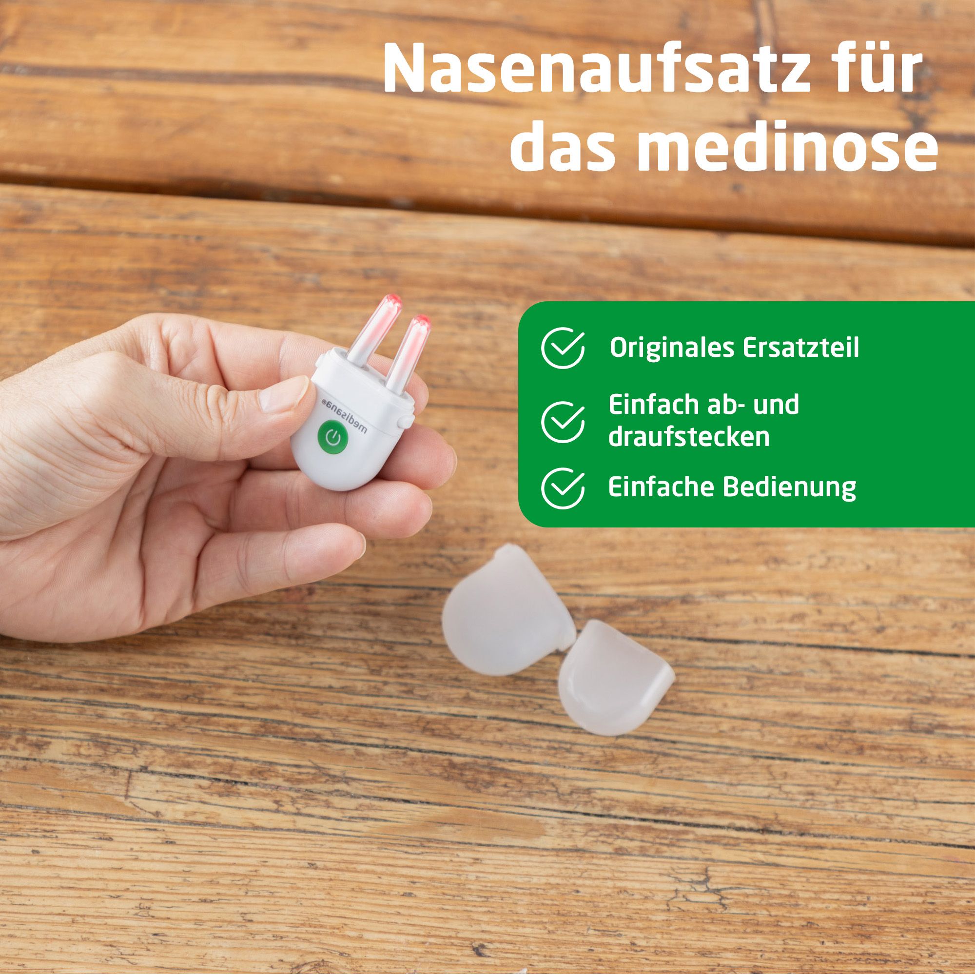 Hand hält Nasenaufsatz für medinose, Ersatzteil, einfach zu wechseln.