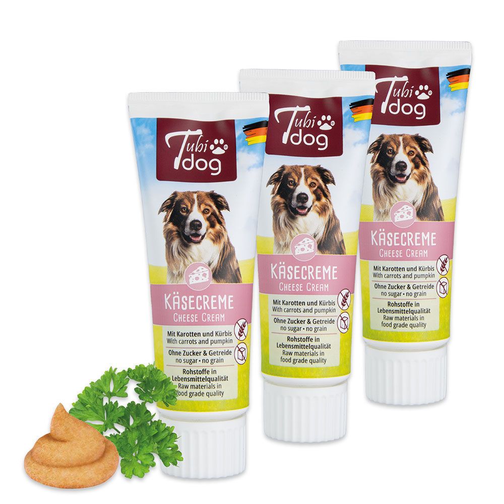 Drei Tubi Dog Käsecreme-Tuben. Aufdruck: Hund, Käsecreme, Karotten & Kürbis, ohne Zucker & Getreide. Mit deutschem Fähnchen.