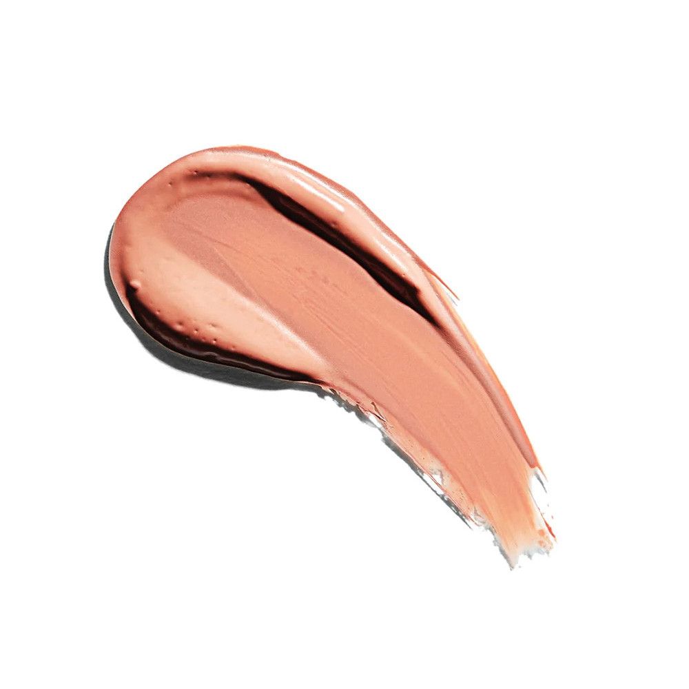 Ein cremiger, rosafarbener Lippenstift-Swirl auf weißem Hintergrund. Die Textur ist glänzend.