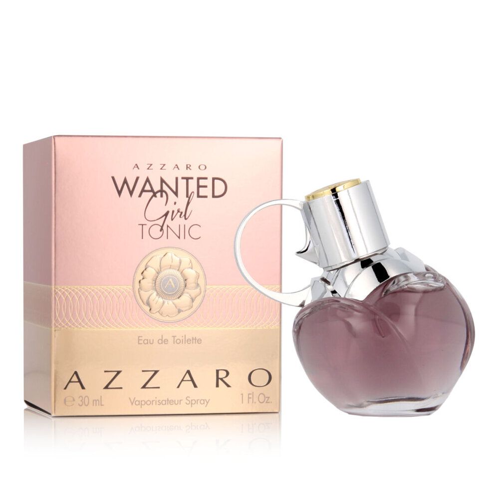 Azzaro Wanted Girl Tonic Eau De Toilette Spray. Flakon in Granatenform, silberner Verschluss. Verpackung mit Produktnamen und Volumenangabe.