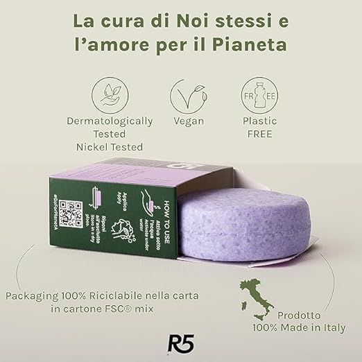 Lilafarbener Balsam in grüner Schachtel. Aufdrucke: Dermatologisch getestet, Vegan, Plastic Free, Made in Italy. R5-Logo.