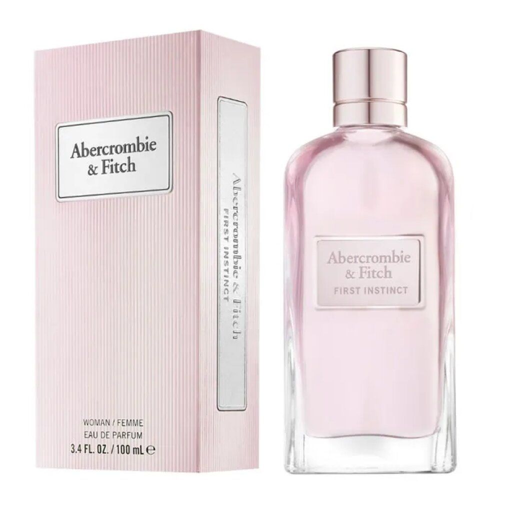 Rosafarbene Verpackung und Flakon. Aufschrift: Abercrombie & Fitch, First Instinct, Woman/Femme, Eau de Parfum.
